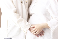 Father-to-be with his pregnant wife